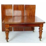 Victorian mahogany wind-out dining table with three additional leaves, on turned legs, width 126cm.