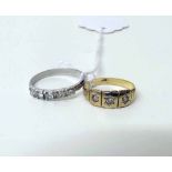 Unmarked white metal 5 stone diamond ring and an antique 18ct 3 stone diamond ring 4.5 gross (2)