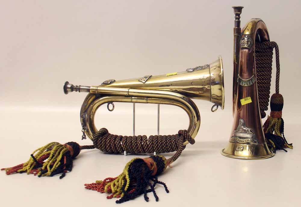 Welsh regiment bugle, 1944 and a Lincolnshire regiment bugle (2). Condition report: see terms and