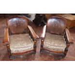 Pair of early 20th century oak framed and leather covered fireside chairs. Condition report: see