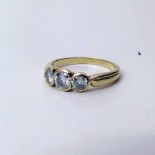 18ct gold three stone ring, 3.9g gross. Condition report: see terms and conditions