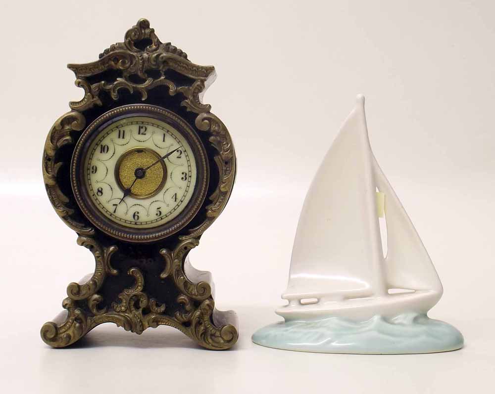 Small Poole yacht and miniature mantel clock. Condition report: see terms and conditions