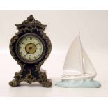 Small Poole yacht and miniature mantel clock. Condition report: see terms and conditions