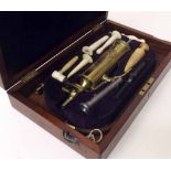 Victorian Enima medical set, fitted in mahogany box with key. Condition report: see terms and