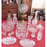 Brass oil lamp with etched glass globe, four cut glass fruit bowls and three decanters, also other
