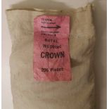 Canvas bank bag of royal wedding crowns, nominally 200 pieces,5752g gross weight. Condition