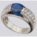 Modern design oval sapphire ring on pave diamond shoulders, indicated 180, set in 18ct white gold,