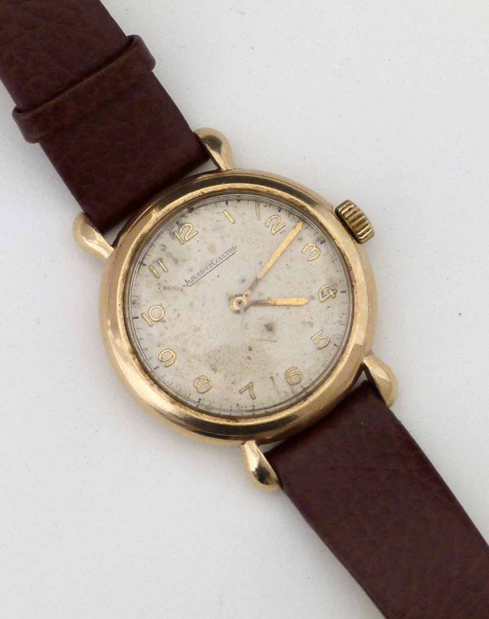 Jaeger-LeCoultre 9ct gold man's wristwatch, Dennison case Birmingham 1952, off white Arabic dial (