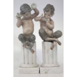 Pair of Lladro Fauns, modelled playing pipes and cymbals whilst sat on a pedestal, incised marks