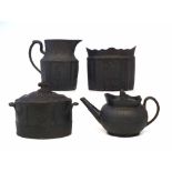 Four items of Black Basalt, to include a lidded sucrier, a Birch teapot, a sucrier and jug by