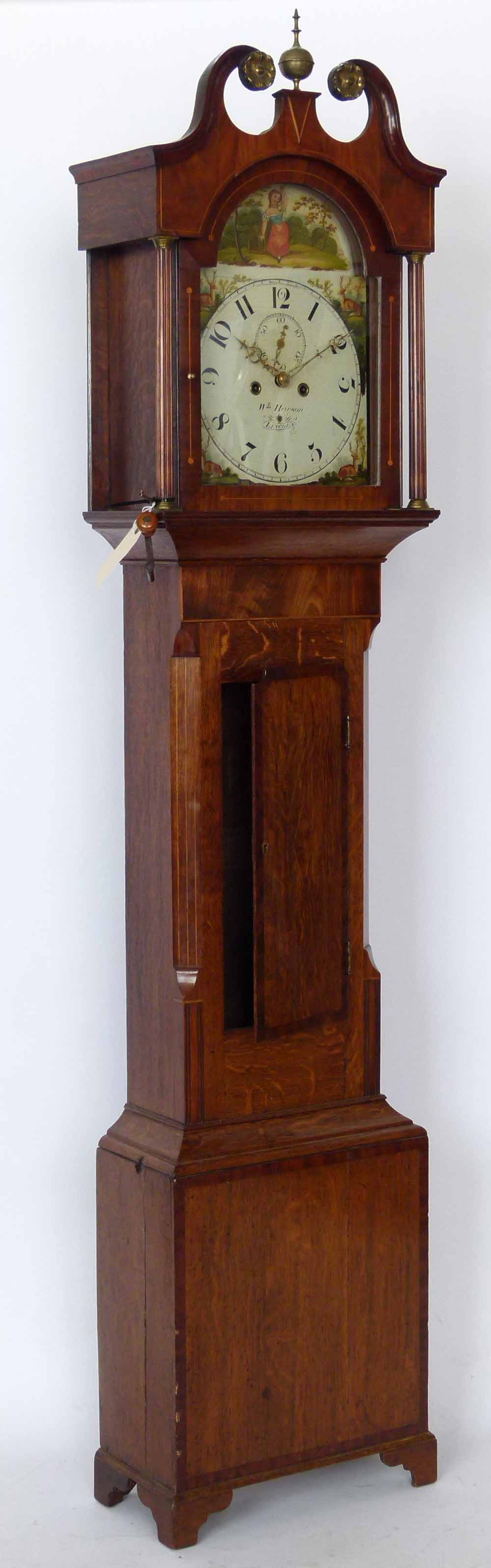 Oak longcased clock banded in mahogany, painted break arch dial named Wm Hewson, Lincoln, eight-