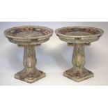 Pair of Cranston pottery tazzas, each bowl supported by four arms on square section bases, decorated