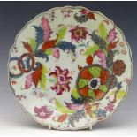 Chinese tobacco leaf plate painted in the typical palette with foliage, diameter 22.5cm