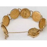 Gold bracelet composed of seven sovereigns, 1899 - 1968, set in 9ct gold, gross weight 67.3g.