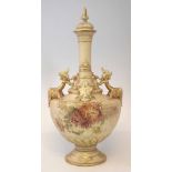 Royal Worcester twin handled lidded vase, decorated with floral designs and raised gilt work after