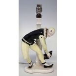 Sitzendorf lamp base, modelled with Pierot wearing yellow and black costume, printed mark to base,