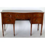 Mahogany serpentine sideboard, 19th century, of three drawers and a cupboard, raised on square