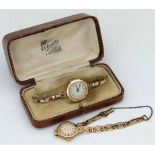 Swiss 9ct gold cased lady's wristwatch, 1928, on a 9ct expanding bracelet; a Hinds 9ct gold lady's