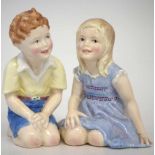 Pair of Royal Worcester figures of Punch and Judy, model numbers 3488 and 3489, (2) 14cm high