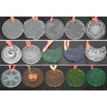 Fifteen Lalique Christmas tree decorations, each with red ribbon, etched marks and dates ranging