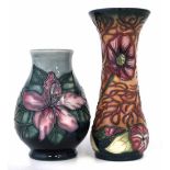 Two Moorcroft vases, one decorated with Cosmos pattern after Rachel Bishop, the second with