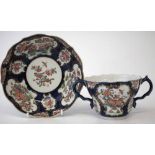 Worcester chocolate cup and saucer circa 1770   painted with a Japan pattern within blue scale