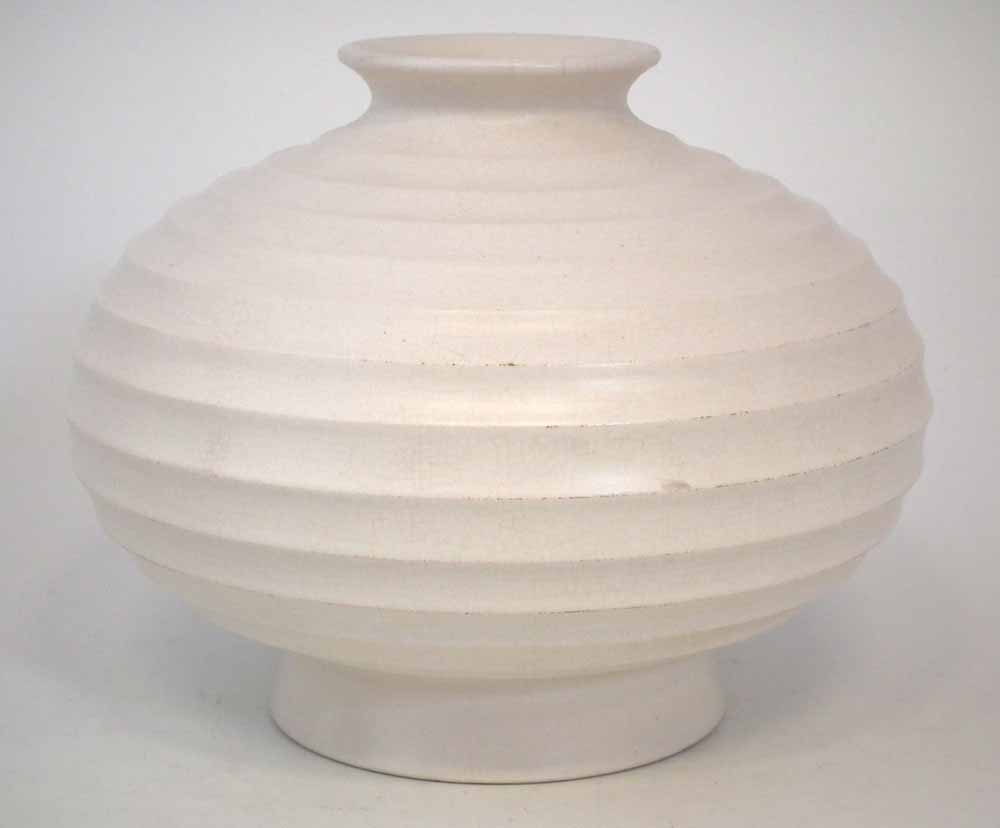 Wedgwood Keith Murray vase   of squat form moulded with horizontal flutes decorated with a moonstone