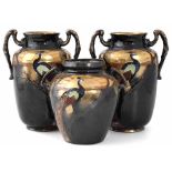 Garniture of three Thomas Foresters Phoenix ware vases  with twin handles, decorated with