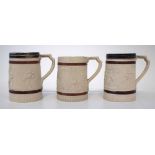 Three Turner Feldspathic stoneware mugs or tankards, circa 1800   moulded with figures drinking, a