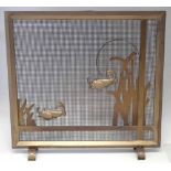 Gilt painted art deco fire screen decorated with fish and stylised leaves. Condition report: see