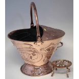 Copper Art Nouveau coal helmet, also a small copper trivet. Condition report: see terms and