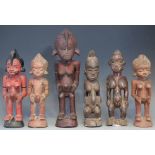 Six red patinated small Senufo figures, (6) the largest measures 32cm high    All lots in this