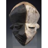 Pende Mbangu sickness mask, with fabric head dress, 24cm high     All lots in this Tribal and