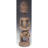 Dogon seated male figure 47cm high     All lots in this Tribal and African Art Sale are sold subject