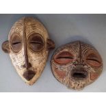 Two Luba masks the largest measures 38.5cm high     All lots in this Tribal and African Art Sale are