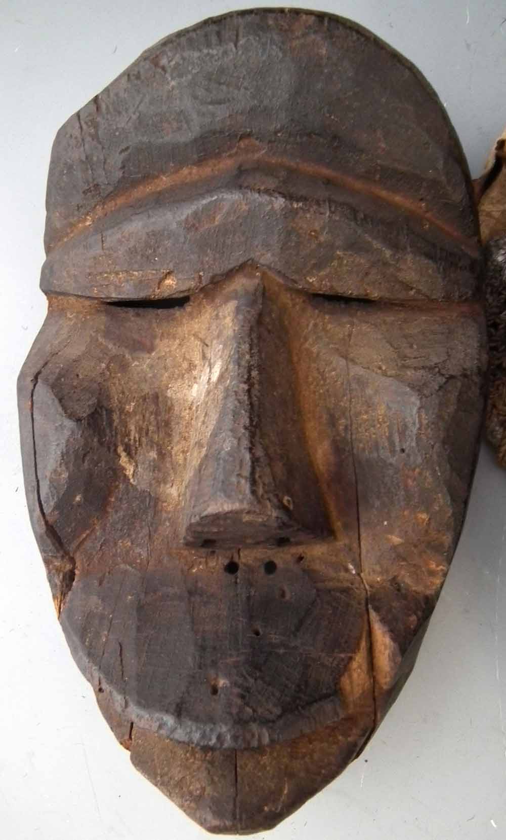 Four African masks including a Pende sickness mask, (4) the largest measures 28cm high       All - Image 6 of 10