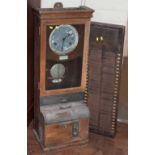 British Time recorder clock and card rack. Condition report: see terms and conditions