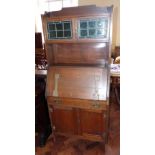 Oak Arts & Crafts bureau bookcase. Condition report: see terms and conditions