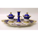 English porcelain desk set possibly Coalport circa 1830   painted with flora and a blue and yellow