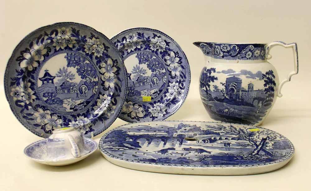 Two Rogers blue and white plates, also a jug and a strainer. Condition report: see terms and