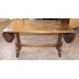 Webber furniture oak refectory style dining table with drop-ends. Condition report: see terms and