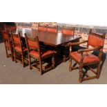 Oak refectory table and eight chairs (1 carver) bearing The Horseshoe Makers mark (formerly