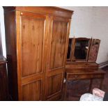 Avonex yew wood two door wardrobe with drawer to base and matching triple mirror dressing table.