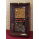 American rectangular cased wall clock with a glass front and two weights. Condition report: see