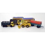 Two Matchbox series vehicles, tractor shovel and stake struck (boxed) and unboxed cattle truck