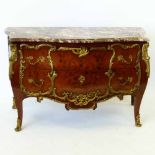 Louis XV syle kingwood bombe commode with applied gilt metal ornament and marble top, length 136cm.
