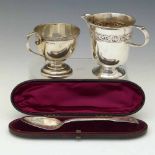 Irish silver cup; Dublin 1958, height 8cm; Irish silver jug; Dublin 1910, height 9.5cm;cased