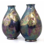 Pair of Shelley Walter Slater vases, decorated with gilt butterflies on blue lustre grounds, printed
