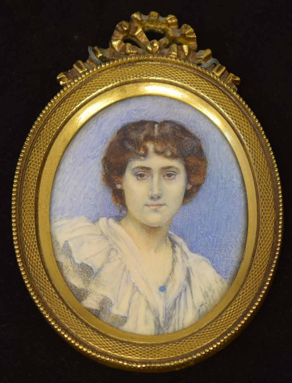 English School, early 19th century,   Portrait miniature of a lady, oval, watercolour on ivory, 6.