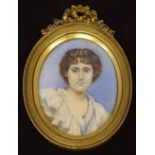 English School, early 19th century,   Portrait miniature of a lady, oval, watercolour on ivory, 6.